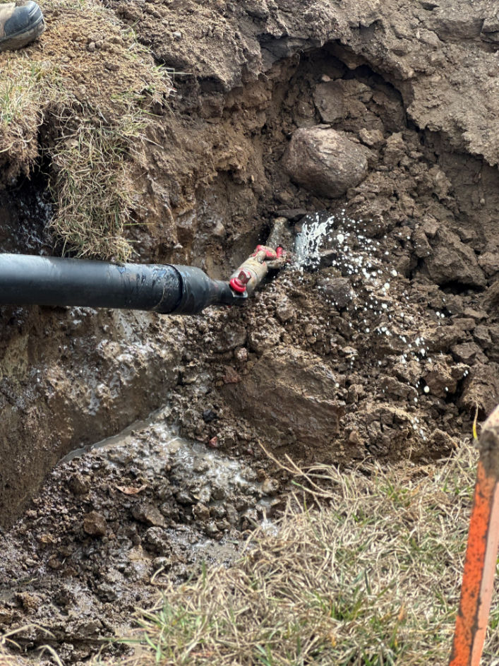 Directional drilling utility bore with drilling fluid visible during underground utility installation by Bergen Brothers Daylighting.