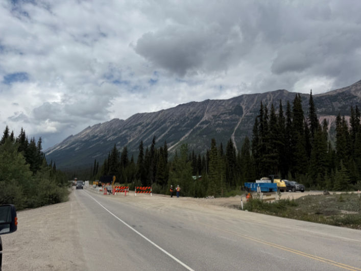 Bergen Brothers Daylighting crew working along a remote highway in mountain terrain.