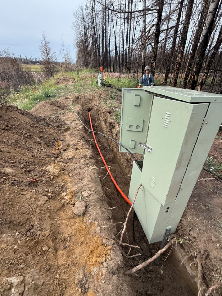 Utility installation trench with conduit and service cabinet for Bergen Brothers Daylighting waterline work